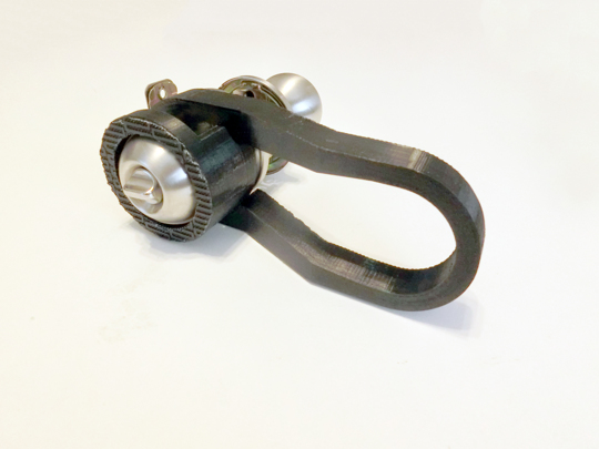 A doorknob with a plastic lever attached to it.